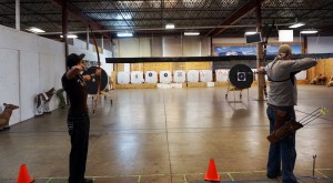 Customers test out some of No Limits' bows. 