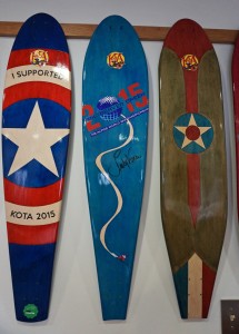 KOTA designed a board for the Alpine Skiing World Championships in Vail (middle) signed by pro skier Lindsey Vonn.