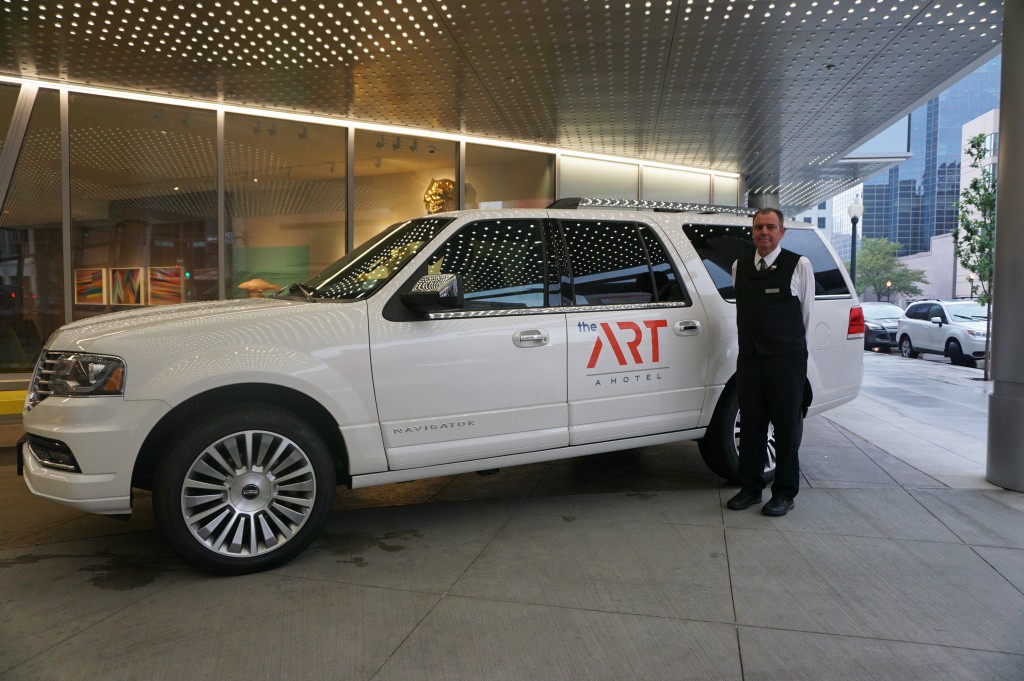 Driver Phil Semenchuk shuttles Art Hotel guests for free in a new Lincoln. Photo by George Demopoulos.