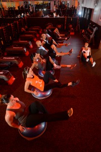 Orangetheory workouts combine treadmill workouts, rowing and weight training. 