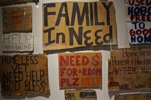 A museum curator collected signs from homeless people in the city for the display. 