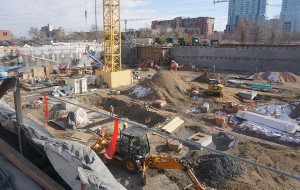 A two-story parking deck is under construction at the Platte Street site. (Burl Rolett)