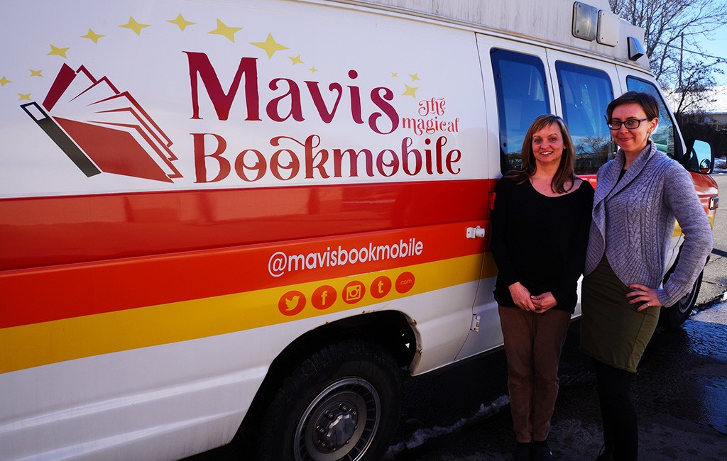 Nicole Sullivan, left, and Anna Kongs in front of the Book Moble. (Amy DiPierro)