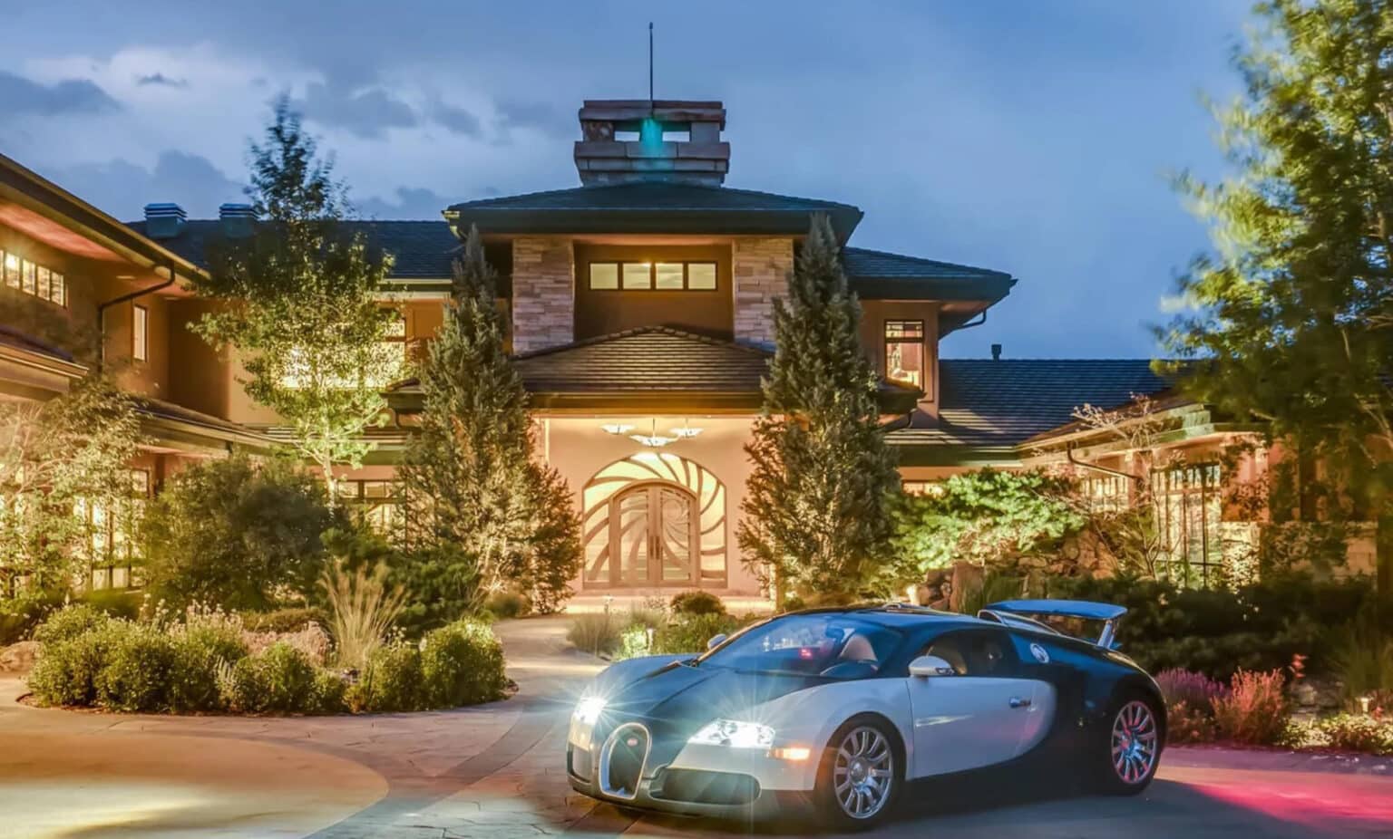 Retired race car driver re-lists Evergreen mansion after $6M price drop ...