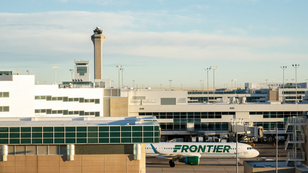 A Frontier plane parked at Denver International Airport