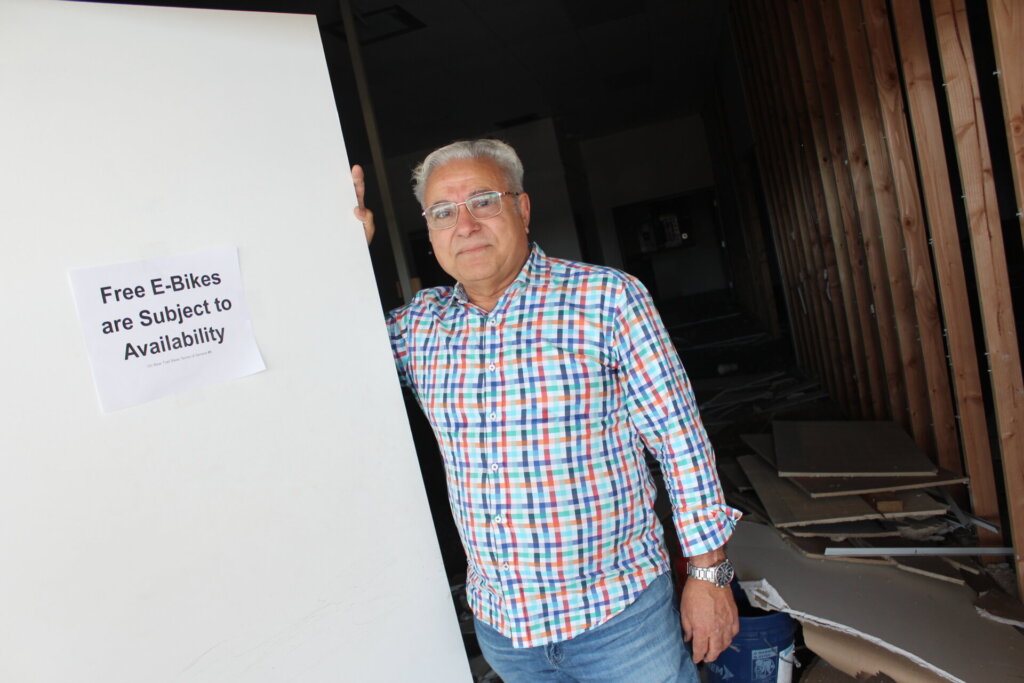 Building owner Saeid Ghaemi inside Bear Trail Bike's former Lakewood store.