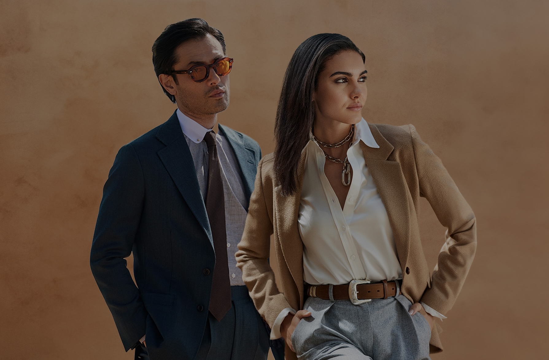 Two models in Tom James' clothing.