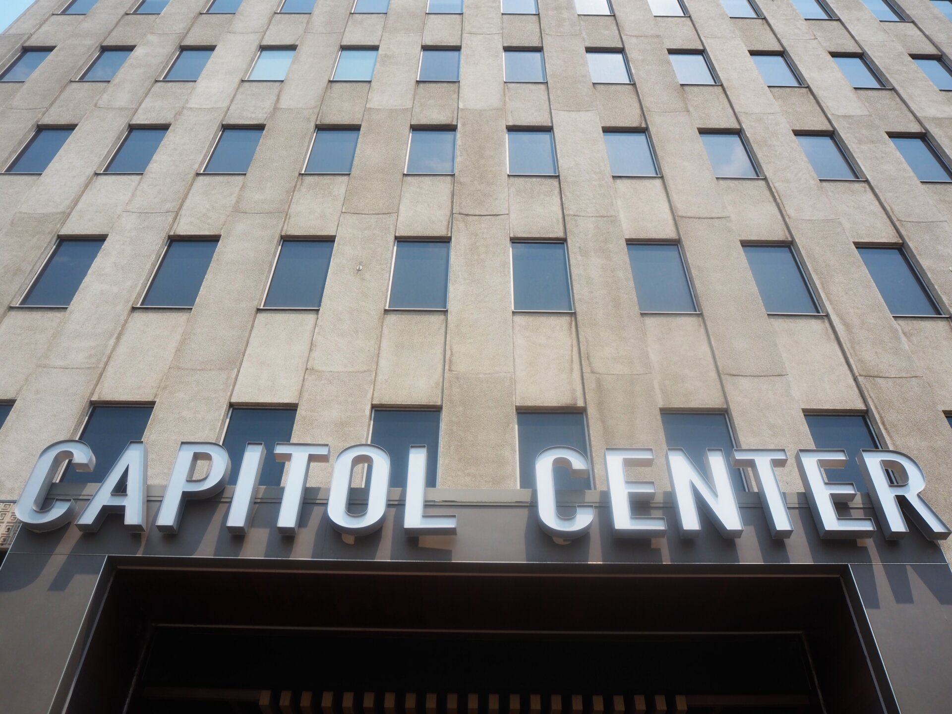 A sign for Capitol Center on Capitol Life Tower