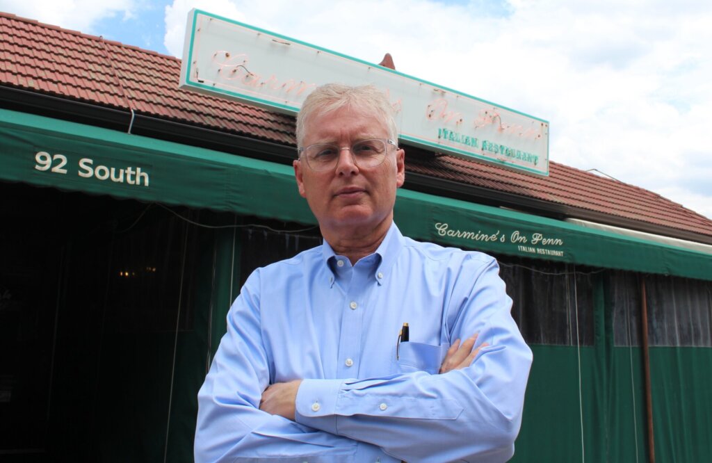 Brad ritter in front of Carmine's on Penn