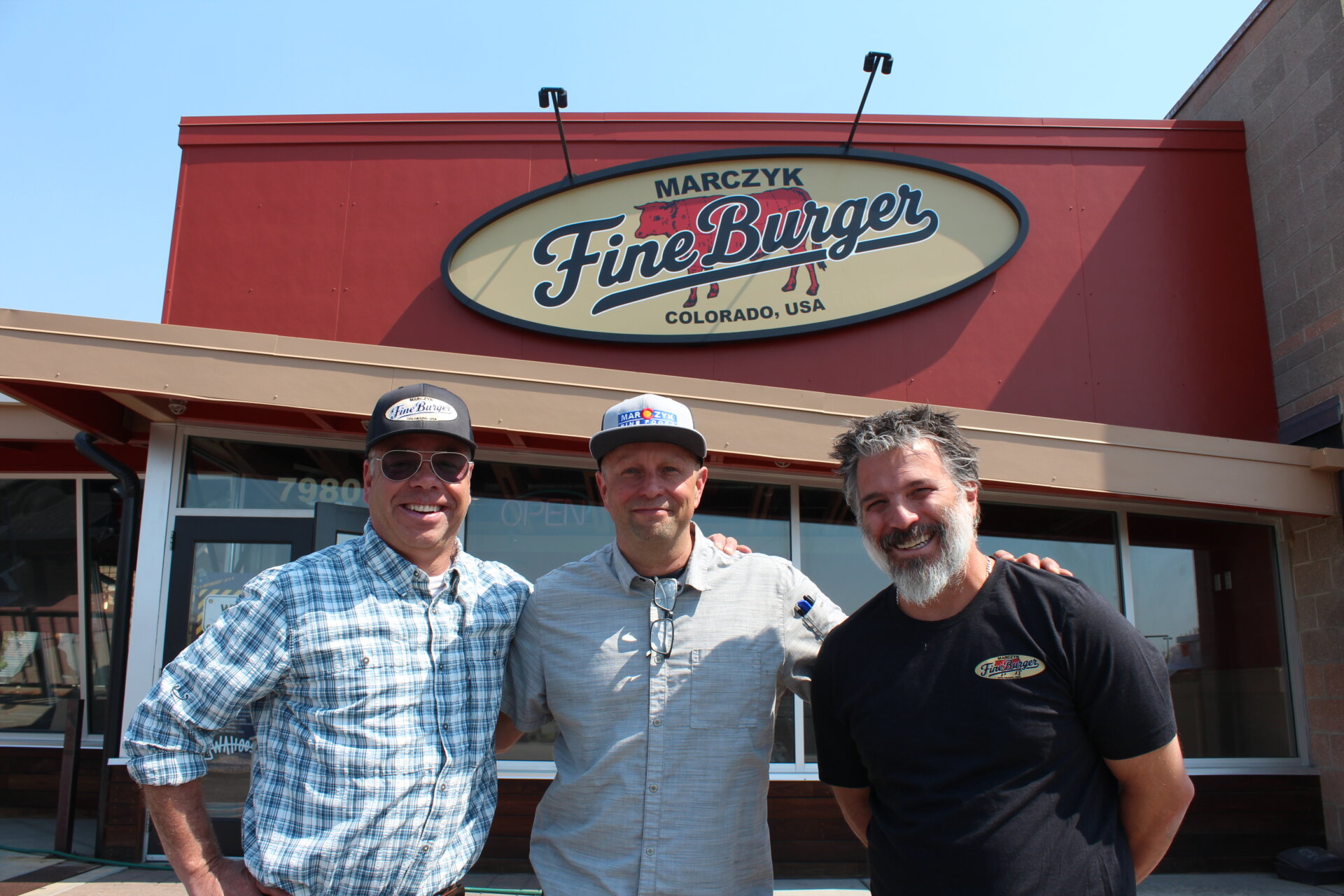 Pete Marczyk, Jamey Fader and Tommy Borrelli outside Marczyk FineBurger.